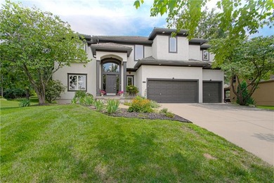 This elegantly crafted 5 bedroom, 4.5 bath home offers refined - photo 1