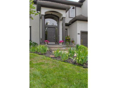 This elegantly crafted 5 bedroom, 4.5 bath home offers refined - photo 3