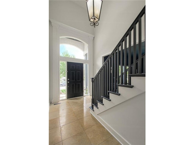 This elegantly crafted 5 bedroom, 4.5 bath home offers refined - photo 5