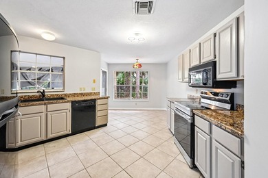 Tucked away in a private setting, this charming 3-bedroom - photo 8