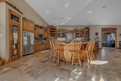 Experience an unparalleled lifestyle in this masterfully crafted - photo 9