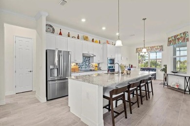 Tucked behind the gates of Harbor West, this exceptional - photo 10