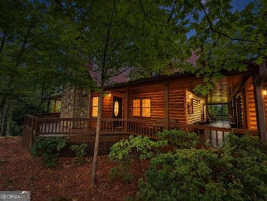 Tucked into a private wooded setting on top of the mountain in - photo 26