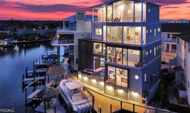A PRIVATE WATERFRONT RESORT IN THE HEART OF CAPE HARBOUR. This - photo 1