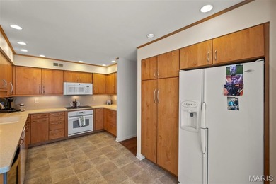 Circa 1986, this 2-bedroom, 2-bath main-floor condo is all about