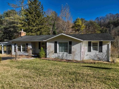 Charming 3 bedroom, one level home on over 5 ACRES WITH CREEK &