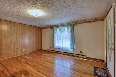 Charming 3 bedroom, one level home on over 5 ACRES WITH CREEK &