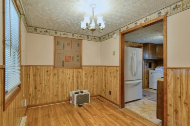 Charming 3 bedroom, one level home on over 5 ACRES WITH CREEK &