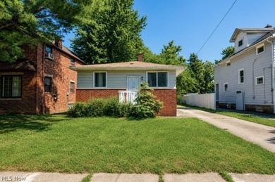Opportunity awaits at 15811 Arcade Ave! This well-maintained - photo 1
