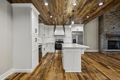 Year-round lake views, a private dock, and enough space for the - photo 11