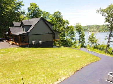 Year-round lake views, a private dock, and enough space for the - photo 45