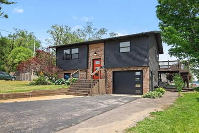 Welcome to Gun Lake! This charming channel front 4 bed, 2 bath - photo 1