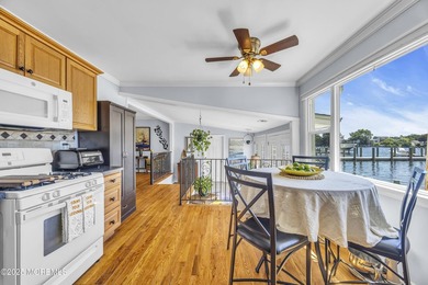 Location, location, location! This rare waterfront home sits - photo 6