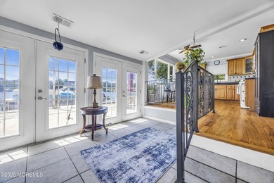 Location, location, location! This rare waterfront home sits - photo 9