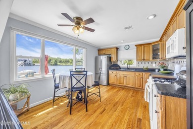 Location, location, location! This rare waterfront home sits - photo 10