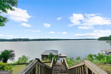 BEST VIEWS YOU'LL FIND ON THE LAKE! This fee-simple (deeded) - Lake Home For Sale in Sparta, Georgia