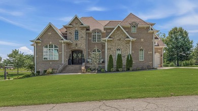 Tucked beside the Paragould Country Club golf course, this - photo 1