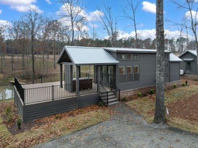 Welcome to The Cottages at Smith Lake, a gated luxury tiny home - photo 1
