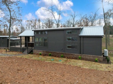 Welcome to The Cottages at Smith Lake, a gated luxury tiny home - photo 2