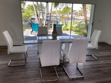 WATERFRONT GEM WITH A PRIVATE DOCK, OCEAN ACCESS & NO FIXED - photo 11