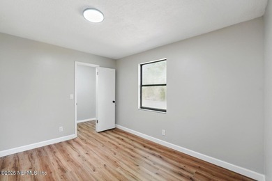NEWLY RENOVATED this gorgeous 3-bedroom, 2-bathroom home with an - photo 11