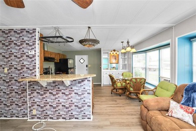 Welcome to easy living in Citrus Woods, an active 55+ community! - photo 12