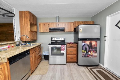 Welcome to easy living in Citrus Woods, an active 55+ community! - photo 13