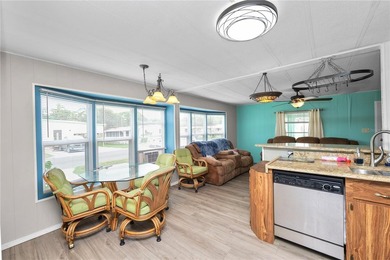 Welcome to easy living in Citrus Woods, an active 55+ community! - photo 16