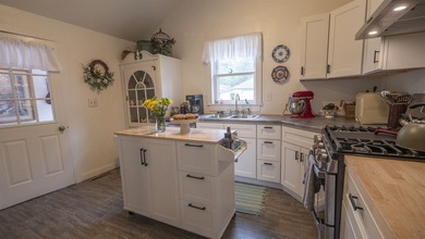 Adorable, updated & perfectly located, welcome to one of - photo 10