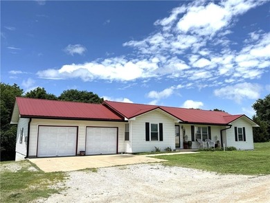 This 3 bedroom 2 bathroom ranch home is located within the gated - photo 1