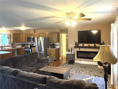 This 3 bedroom 2 bathroom ranch home is located within the gated - photo 3
