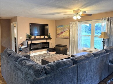 This 3 bedroom 2 bathroom ranch home is located within the gated - photo 4