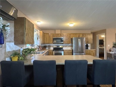 This 3 bedroom 2 bathroom ranch home is located within the gated - photo 8