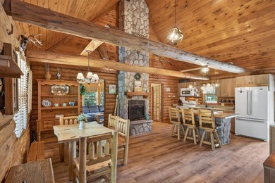 Well maintained and cared for, this charming log home retreat - photo 5