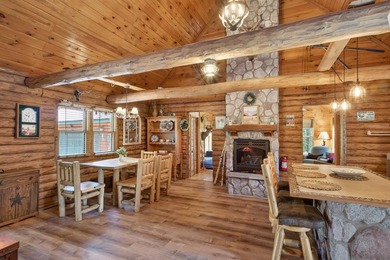 Well maintained and cared for, this charming log home retreat - photo 6