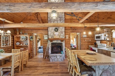 Well maintained and cared for, this charming log home retreat - photo 7