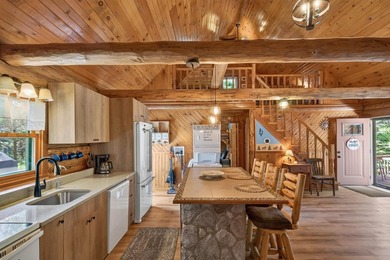 Well maintained and cared for, this charming log home retreat - photo 9