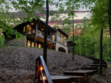 Luxury lakefront home truly blends with its natural setting on - Lake Home For Sale in Crane Hill, Alabama
