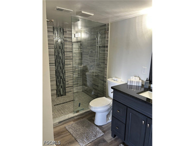 Gulf Access 2 bed 2 bath 1 car carport condo with 10k boat lift - photo 7