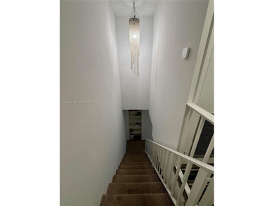 Welcome to this charming condominium located at 8785 SW 137th