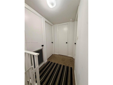 Welcome to this charming condominium located at 8785 SW 137th