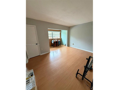 Welcome to this charming condominium located at 8785 SW 137th