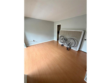 Welcome to this charming condominium located at 8785 SW 137th