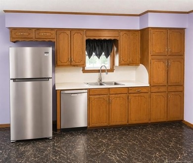 Discover peaceful country living on Rock Creek Street. This - photo 4