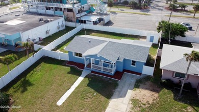 Coastal living meets modern comfort--just one block from the - photo 3