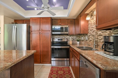 Check out this turnkey Puamana 2 bed, 2 bath end unit with - photo 3
