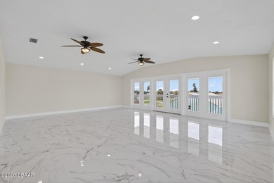 Positioned just steps from the sand in one of Ormond Beach's - photo 8