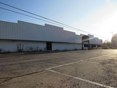 Discover a versatile commercial prospect on nearly two acres!
