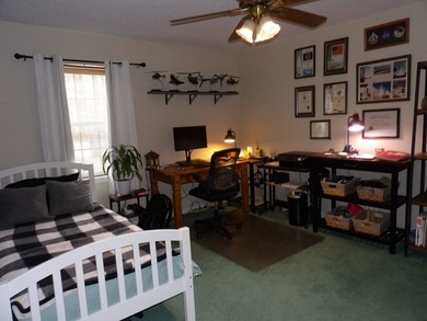 Well-maintained property featuring a 14' RV carport with hookups - photo 18