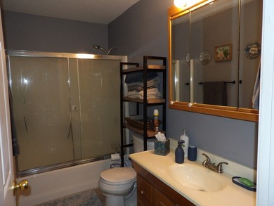 Well-maintained property featuring a 14' RV carport with hookups - photo 21
